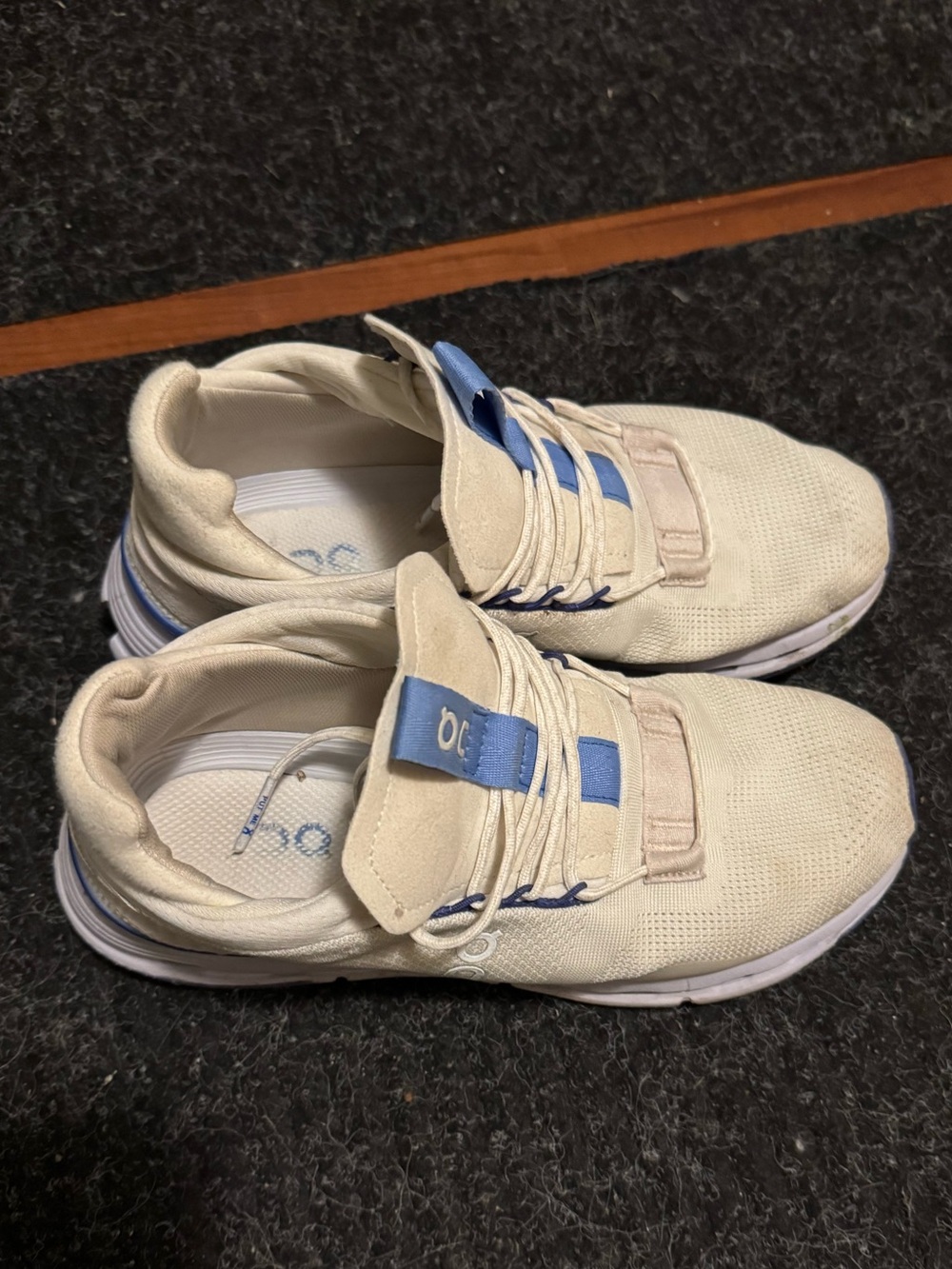On Running Cloud Nova Sneakers in Off-White with Blue Accents